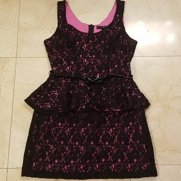 pink and black peplum dress Catherine Dress This is a fitted hot pink peplum dress with black lace detail